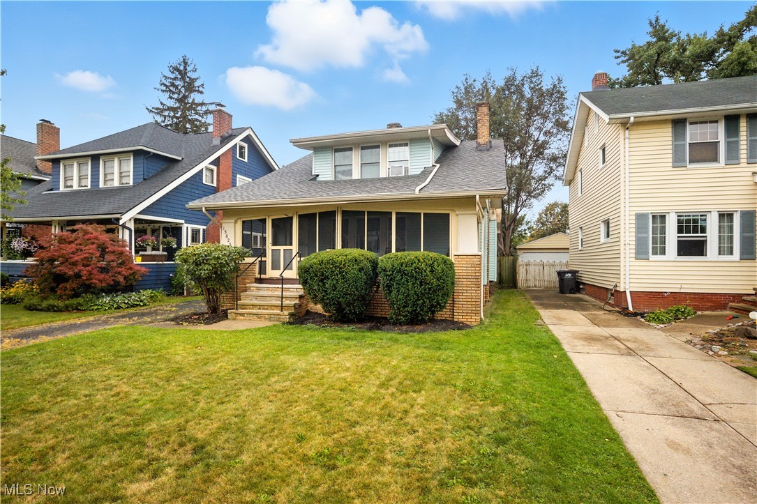 Welcome to this charming four-bedroom, one-and-a-half-bath home in the heart of Lakewood! Thoughtfully updated, this property features vinyl siding for easy maintenance and a bright kitchen with white cabinetry, sleek black granite countertops, and a cozy built-in eating nook. A formal dining room with corner built-ins and a spacious living room with a faux fireplace and additional built-ins add warmth and character. The screened-in front porch is perfect for morning coffee or evening relaxation. The full basement has been reinforced with structural beams, offering peace of mind along with plenty of storage or hobby space. Outside, you’ll find a yard that’s a blank canvas for your landscaping ideas, plus a single-car garage. With central air, a roof replaced in 2021, and a home warranty included, this home blends charm, updates, and convenience—all in a great Lakewood location!
