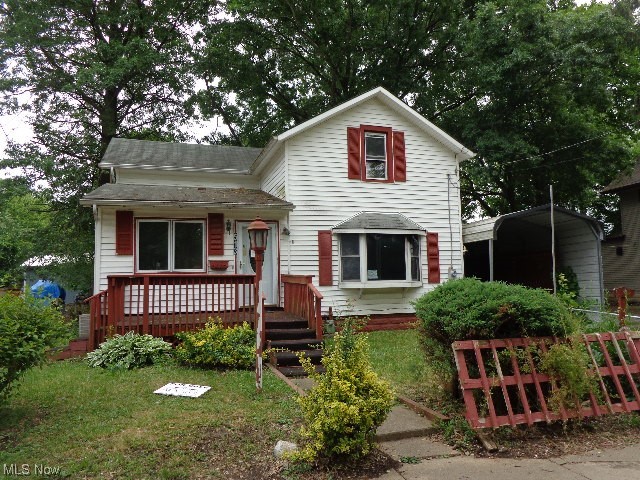 513 Washington has so much to offer in space, storage. Bring your design ideas with all the possibilities. Paved drive with car port leading to car garage with space for workshop or storage. Greenhouse like building behind the garage. Back yard has mature trees room for entertaining. Property is being sold "As-Is" without warranty. Property is a must see!