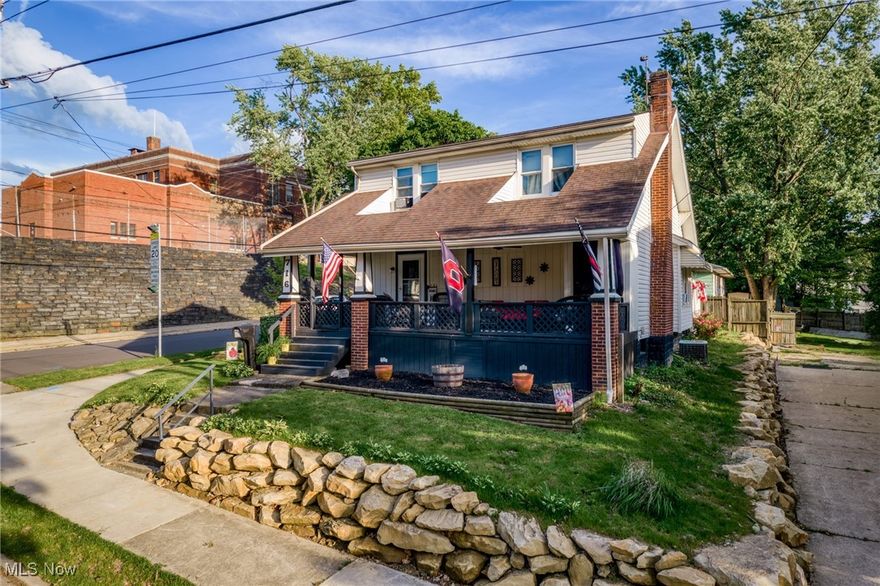 High upon 9th St hill, on the corner of 9th & Polk, just across the street from Pfeiffer Elementary's big rock wall, the same sturdy and attractive colonial style home sits today that sat there when Herbert Hoover took office (1929). Having housed the same family since 1970, this home is the model of consistency and an expert in growth and expansion. 716 Polk is just big enough and versatile enough to be whatever your growing family needs it to be. Featuring a huge updated kitchen (2019) that includes a new triple basin sink and faucet, vinyl floors, can lights, and maple cabinets, a XL dining room with window seat and french doors leading to the giant living room with working wood burning fireplace and built-in bookshelves, a full bath on every floor, 1st floor and basement bonus rooms that act as 4th and 5th bedrooms, if necessary, big bedrooms, all with extra storage, a gigantic private front porch with storage, side door dog pen and deck, there is no shortage of character or space. There is so much to love, but its you that your family will love for making this home yours. A $14k rock retaining wall with a lifetime transferable warranty was added in 2024. Paint and carpet throughout in 2024. The fireplace was cleaned and serviced in October of 2023. Situated comfortably in a family-friendly neighborhood, with Akron's best highway accessibility, and nearby to a host of conveniences and destinations alike, this is a great place to call home. Don't sleep on 716 Polk, sleep in it!