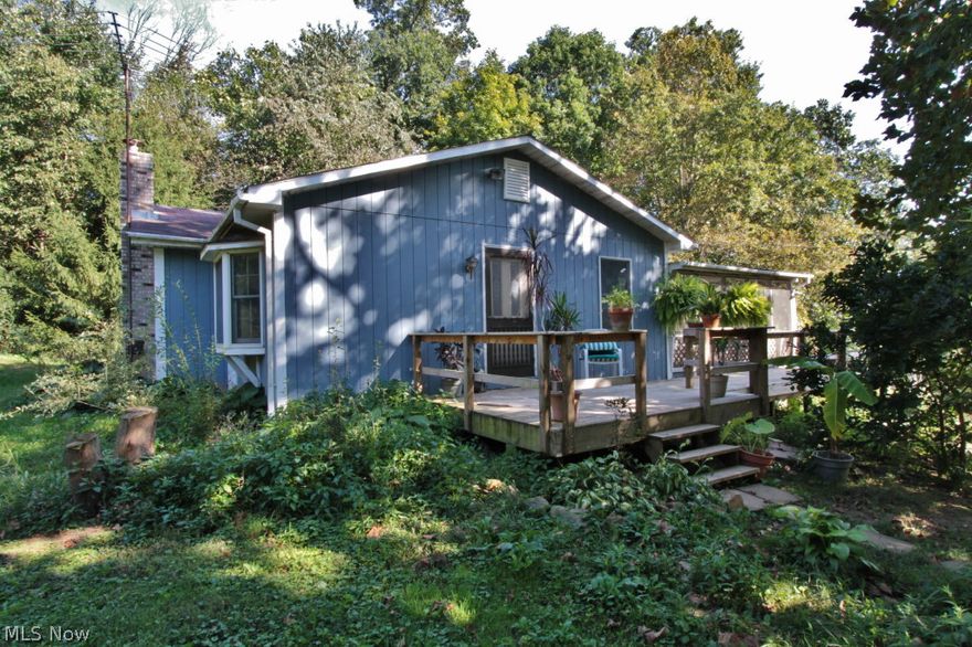 Looking for seclusion, privacy and a breath taking view  ? This home offers all three and much more . 3 bedrooms, 2 full baths , large living room , first floor laundry, open eat-in-kitchen , covered back porch,  wrap around deck.  2 outbuildings , 2 chicken coops , 12.12 acres with all mineral rights .  Partial fenced in area for horses and cattle.   Great location .  Easy commute to Columbus, Newark, or Zanesville .  Interior pictures will be posted soon.  Call today for your private showing  .