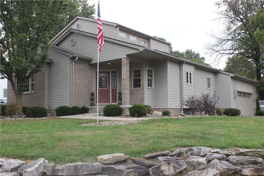 Beautiful home in Newton Falls! This well built home has a 1st floor bed & bath, a 2nd floor bed & bath and a bed & bath in the lower level. High ceilings, oak trim & doors & skylights are a few of the unique features in this home! It is so well maintained, you can move right in! There is 1933 sq. ft. of living space plus an additional 770 sq. ft. of living in the lower level w/a walk-out into the garage. The lower level features a large rec room, wet bar, bull bath & bedroom. This home has an abundance of closet & storage space. An oversized 2 car garage is attached plus a private breezeway leads to an additional 2 car garage! This great home sits on a corner lot w/2 driveways! Call today!