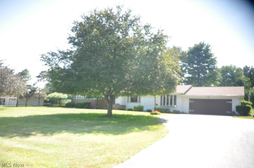 Exceptional custom built ranch on 1.25 acres. Picturesque setting with 181' frontage set back off the road with ceramic foyer presenting a spacious living room w/fireplace & molded ceiling open to large dining area w/sliding door to a spacious screened porch w/view of meandering lawn. Dining room also open to over-sized birch & ceramic kitchen w/countertop range, wall ovens, dishwasher, disposal, refrigerator & desk. Adjoining to family room w/10' bow window. All  woodwork has a soft birch tone on plastered walls. 3 spacious bedrooms with 6' closets, 3.5 baths, full basement ready for your imagination. Central air, gas forced air heat & gas hot water heat, whole house fan plus vast amount of storage. Double car garage, 10 x 28 patio, 10 x 14 concrete floored shed add to this beautiful home ready for a new owner.