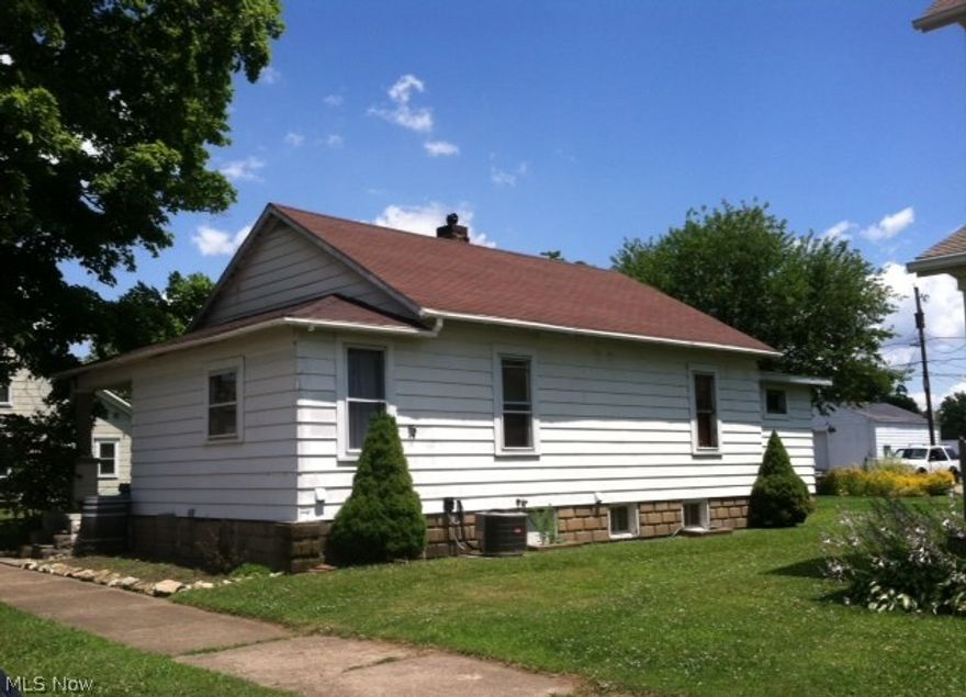 Explore the possibilities in this three bedroom home!  The kitchen and bathroom have been totally redone.  Newer flooring throughout the entire home other than the bedrooms.  Hot water tank just replaced in 2014!  Central air was installed in 2012.  Not only does this home have all o these updates, BUT it also comes with an EXTRA lot!  Don't miss out on this great opportunity!