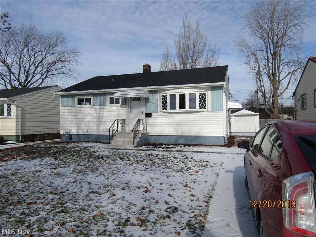 This home has been completely renovated from top to bottom starting with has fresh paint everywhere, refinished hardwood flooring throughout the living room and bedrooms, and new trending ceramic flooring in the kitchen and both bathrooms. The basement and stairs have new laminate flooring. The kitchen features granite counter tops, an under mount stainless steel double sink and new appliances. The electrical box is new along with a new HVAC system and hot water tank. The house and garage both have new roof, and the garage has been completely rewired. This home is ready for you to move in.