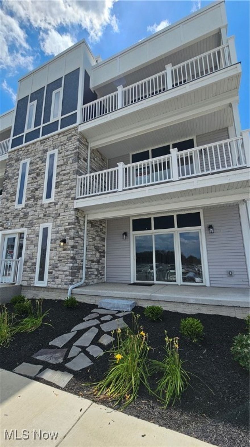 Enjoy panoramic water views from this beautifully appointed, fully furnished, waterfront condo featuring custom-designed enclosed balconies and the perfect coastal decor. Step outside to the breathtaking sunsets over the marina, visible right from your private terrace. Don't forget to checkout the rooftop patio with 360 degree views of Marblehead and the Sandusky Bay. And don't worry, dockage is available and waiting for you in direct view with a FREE 2026 slip lease! Located just steps from your lakehouse is the clubhouse, sandy beach, heated pool and vibrant community events, this is more than a home it's a lifestyle. Act fast this waterfront gem won't last long! Walk ins at the Marblehead Estates sales office are welcome!