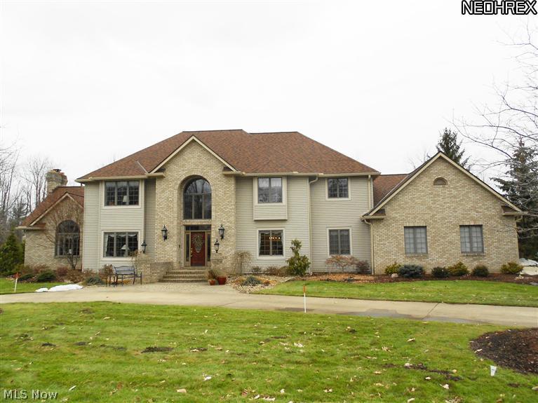 Elegance at its best! Circular drive & front stone patio welcome you to this exquisite 5 bedroom, 4 full & 2 half bath custom built home in Canterbury On The Lakes. Expansive gourmet eat-in kitchen features hdwd floors, granite counters, breakfast bar & SS appliances. French doors open to striking 1st floor office. Large dining room w/trayed ceiling, formal living room, vaulted family room w/built-ins, gas FP & wet bar. Convenient 1st floor laundry, spa-like master suite offers gorgeous vaulted bath w/newer heated tile floors, heated jacuzzi tub, glass block shower, double walk-in closets & skylights (2012-13). Two staircases make easy access to 2nd floor from front or back of house. Finished lower level offers rec room, media room & half bath. 1st floor full bath w/changing room opens to the private & tranquil backyard. Beautiful in-ground pool, Timber Tech deck, stone patio & gazebo create the perfect space for entertaining. Four car garage, home warranty w/pool coverage.