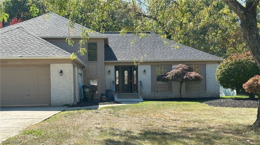 Welcome to 25615 Hidden Acres Dr — a beautifully updated 4-bed, 2.5-bath split-level in desirable Westlake! Offering 2,828 sq ft of living space plus an 868 sq ft basement on a private, tree-lined lot.
The stunning two-story foyer sets the tone with hardwood floors and a graceful staircase with decorative wrought-iron railings. The fully renovated kitchen features granite countertops, subway tile backsplash, two-tone cabinetry, and stainless steel appliances. The spacious family room boasts a brick fireplace  — ideal for entertaining.
The primary suite includes a barn door entry, walk-in closet, and a private en suite with frameless glass shower and marble-look tile. Two additional bedrooms and an updated full bath complete the upper level. Finished basement offers great potential. Serene fenced backyard backs to mature trees. 2-car attached garage, central A/C, and gas heat included. Located in Westlake City School District — minutes from Crocker Park, dining, and highways. Move-in ready!