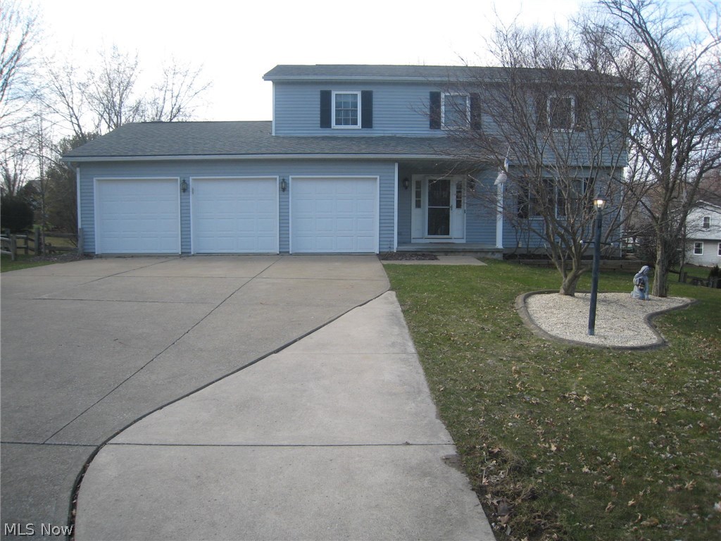 Welcome to this spacious move in ready Colonial situated in a quiet cul-de-sac with a walk out lower level. As you enter the foyer, you will love the dark toned flooring that flows throughout the entire home. Freshly painted throughout in a soft gray shade, with white trim, enhances the inviting living and dining rooms. The applianced eat in kitchen with pantry is just steps away and the open floor plan continues into the 30' fireplaced family room. Perfect for entertaining family, friends and guests. Step out of the sliding glass doors to the multilevel deck that overlooks the spacious back yard and view the patio, your own private basketball court and a storage shed. A convenient half bath is off the foyer. The walkout lower level with "man cave", was completely remodeled in 2013 with drywall, carpet and paint, walks out to the patio area, new in 2016. The laundry area also features a wall of built in storage. The master bedroom easily accommodates "king size" furniture has a f