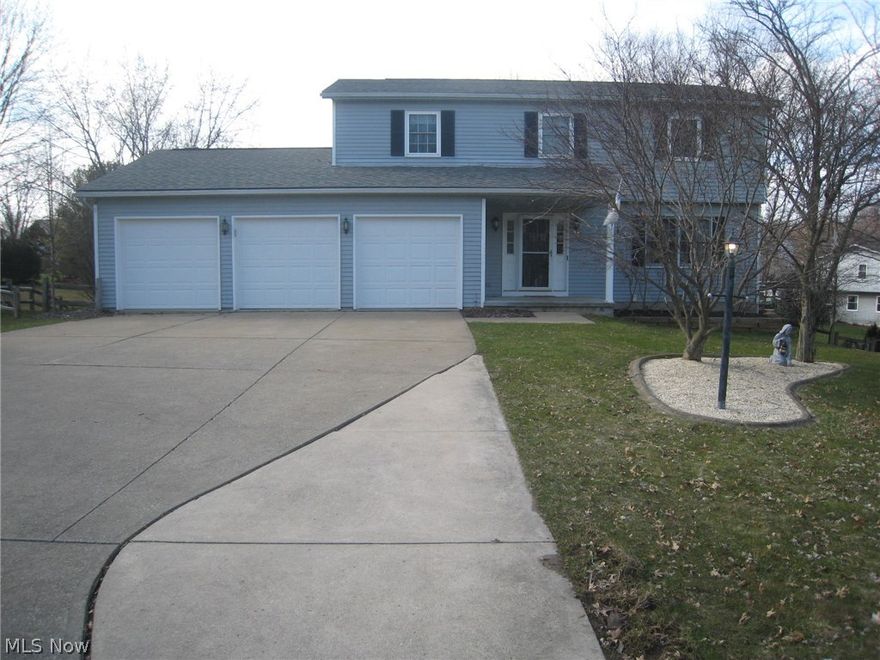 Welcome to this spacious move in ready Colonial situated in a quiet cul-de-sac with a walk out lower level.  As you enter the foyer,  you will love the dark toned flooring that flows throughout the entire home.  Freshly painted throughout in a soft gray shade, with white trim, enhances the inviting living and dining rooms.  The applianced eat in kitchen with pantry is just steps away and the open floor plan continues into the 30' fireplaced family room.  Perfect for entertaining family, friends and guests.  Step out of the sliding glass doors to the multilevel deck that overlooks the spacious back yard and view the patio, your own private basketball court and a storage shed. A convenient half bath is off the foyer. The walkout lower level with "man cave", was completely remodeled in 2013 with drywall, carpet and paint, walks out to the patio area, new in 2016. The laundry area also features a wall of built in storage. The master bedroom easily accommodates "king size" furniture has a f
