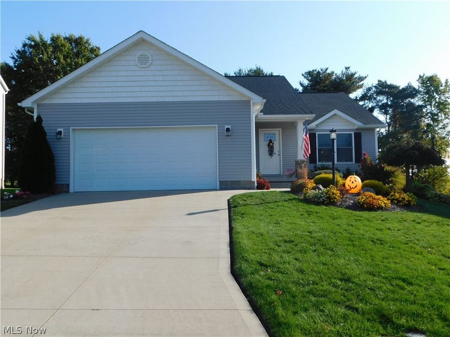 This gorgeous ranch home was built in 2015 and you are going to love the open floor plan!  The kitchen offers a ton of storage, granite counter tops, pantry and lots of workspace.  The natural wood floors and quality throughout show the thought and love that went into building this home.  Beautiful French doors lead out to a bright and sunny four season room with a wonderful view of the backyard and stamped concrete patio.  The spacious Owner's suite offers a walk-in closet, the bath offers dual sinks and weal-in shower.  The high finished lower level brings additional living space and is plumbed for a third bathroom.  The pool table conveys and there is still more than ample space for storage.  A natural gas line runs out to the grill and the fire pit (fire pit conveys!) so no need to worry about running out of gas on those cool evenings hanging out by the fire.  If one floor living is what you desire, here it is!