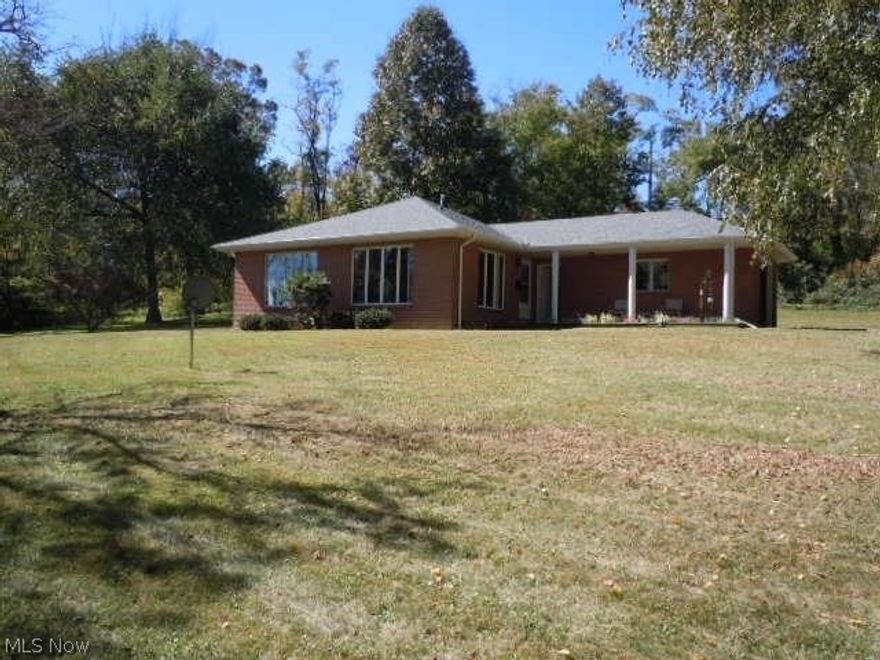 COUNTRY SETTING - CUTE BRICK RANCH - KIT/DR COMBO, 2 BR'S, 1 BATH; CENTRAL AIR; ATTACHED GARAGE; SITS ON 3.2 ACRES