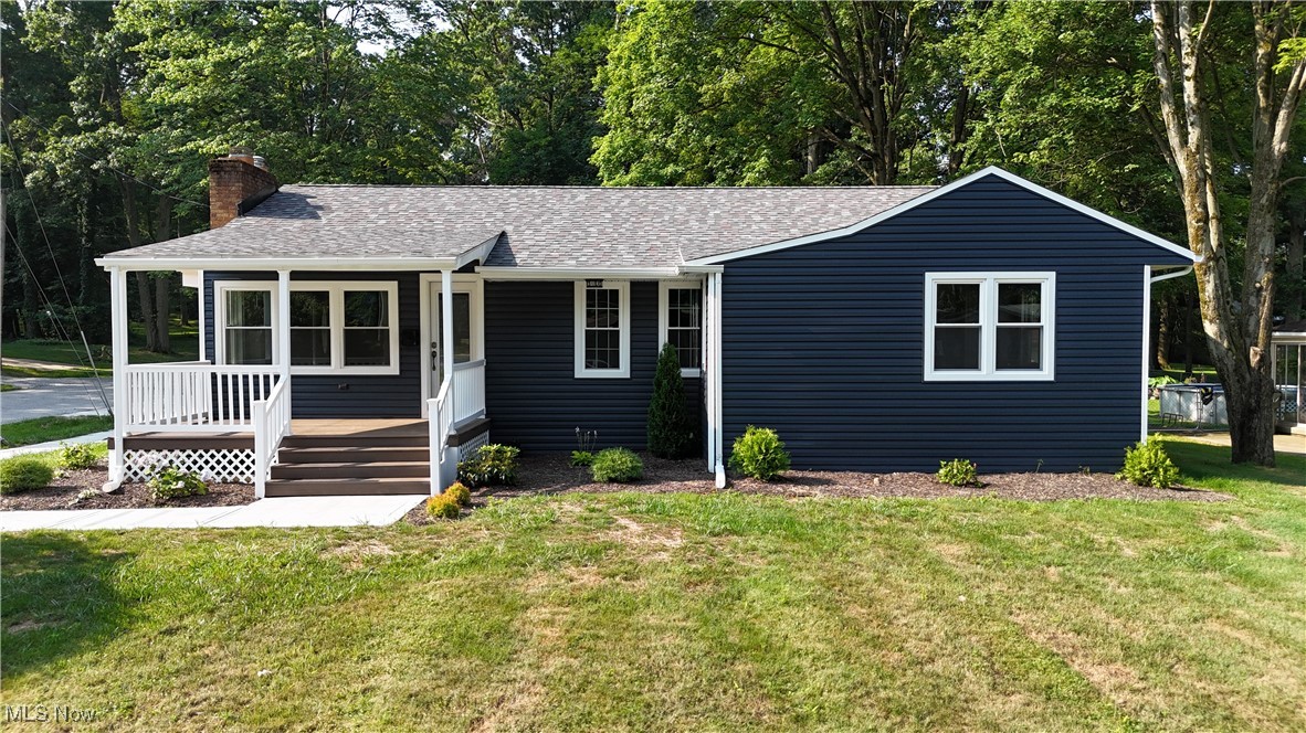 Wow! Welcome to 1974 Hawthorne! This is a beautiful ranch-style home on a quiet dead-end street. The home has been thoughtfully updated throughout. Inside, you'll find new LVT flooring, freshly painted rooms, three bedrooms, and two full baths on the main floor. Additional highlights include new vinyl windows, first-floor laundry with a new Maytag washer and dryer, and a gorgeous kitchen featuring white cabinetry, granite countertops, a single-bay sink, new Whirlpool appliances, a glass tile backsplash, and large windows overlooking the side and back yards. The kitchen is open to the dining room, which is open to the huge living room featuring a wood burning fireplace and access to both the front and side porches. The exterior boasts a new roof, vinyl siding, gutters, downspouts, garage doors and openers, and three new porches built with low-maintenance composite decking and vinyl railings. The attached, side-entry two-car garage offers direct access to the kitchen, along with a door leading to the side porch and yard. The large, unfinished basement includes a full bathroom and offers ample space for a future family room, as well as utility and storage areas. Call your REALTOR to schedule your private showing today!