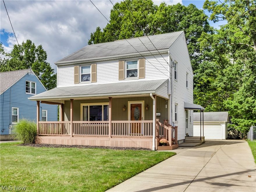 This impressive colonial, boasting 1788 square feet, has been pristinely kept for over 60 years. The formal living room and dining room, large family room with wood burning fireplace all showcase brilliant hard wood flooring.  Replacement windows allow for lots of natural sun light in every room.  The fully applianced kitchen features impressive oak cabinetry. A handicapped accessible full bath and a guest bathroom are also included on the first level.  There are three nicely sized bedrooms that all have wood flooring and another full bath on the second floor. The full basement could easily be converted to a large rec room.  A spectacular front porch spans the length of the home and is constructed of a maintenance free material.  Finally have the garage of your dreams, an oversized two car with an attached workshop that includes heat and running water!  This could easily be your forever home!  Don't miss your chance.  Call for your private showing today.
