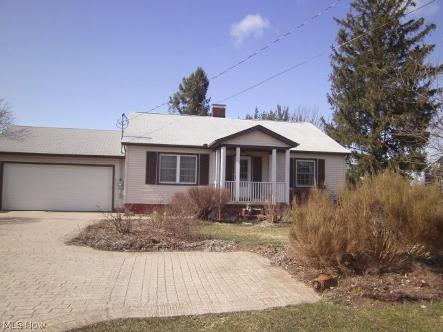 Warm comfortable open- flowing floor plan, completely up-dated, like move in condition, home. Great kitchen with new cabinets (with auto soft close) 3 years ago, copper hood and wall over the range and a pantry closet.  Beautiful hardwood floors complimented by great warm colors through out the living area. Newer roof, high efficiency heating and central air conditioning, new windows, updated 200 amp electric, 2 car attached garage, deck with garden room (outside 3 season room). Lower level is finished providing a great living space included in the total living space number. Full fireplace(never used) with walk out to the screened porch. Raised garden beds for vegetables. Warm and comfortable, ready to move in home for a comfortable price.