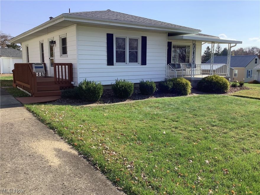 Lovely 3 bedroom, 2 full bath ranch located on the north end with a full basement.  Two car garage (one entrance from street & one entrance from alley), extra lot, covered front porch for relaxing, and a deck on the side of home.  Original hardwood floors under carpet throughout house.  Gas furnace, central air, large finished family room in basement plus full bath.  Laundry room, furnace room, and workshop in basement.  Close to schools and all conveniences.  New gas hot water tank installed November 30, 2023.  Great neighborhood.