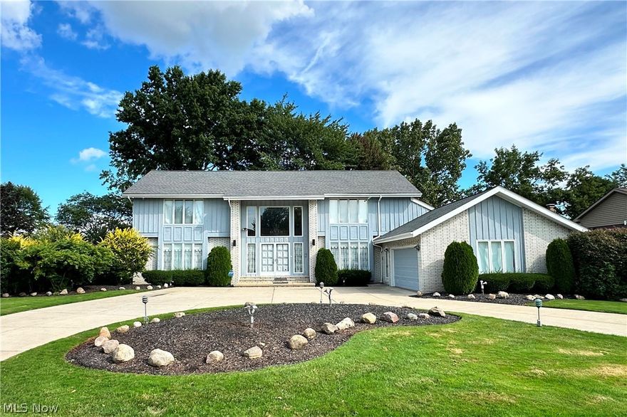 Remarkably spacious, One Owner, Custom Colonial on almost half-acre lot! Two story foyer with beautiful crystal chandelier opens to Living Room and Dining Room, and oversized Family Room with vaulted and beamed ceiling, floor to ceiling fieldstone fireplace and wet bar for the ultimate in entertaining! Large eat-in Kitchen features center island with breakfast bar, skylights, planning desk, ample cabinetry and sliding doors to the expansive deck overlooking a private and park like back yard! Bedroom on first could easily become an office or guest suite with adjacent full bath. Convenient half bath and laundry room with storage complete the main level. Take the open staircase to second level bridge between bedrooms! Spacious Primary suite offers two large walk-in closets, dressing area with make up vanity, and bath with step-in shower, jetted tub and a bidet! Two additional bedrooms on second share a full bath in hall with shower over tub. Unfinished basement is 1682 square feet of potential! Attached two car side load garage with circular drive! Won't last.