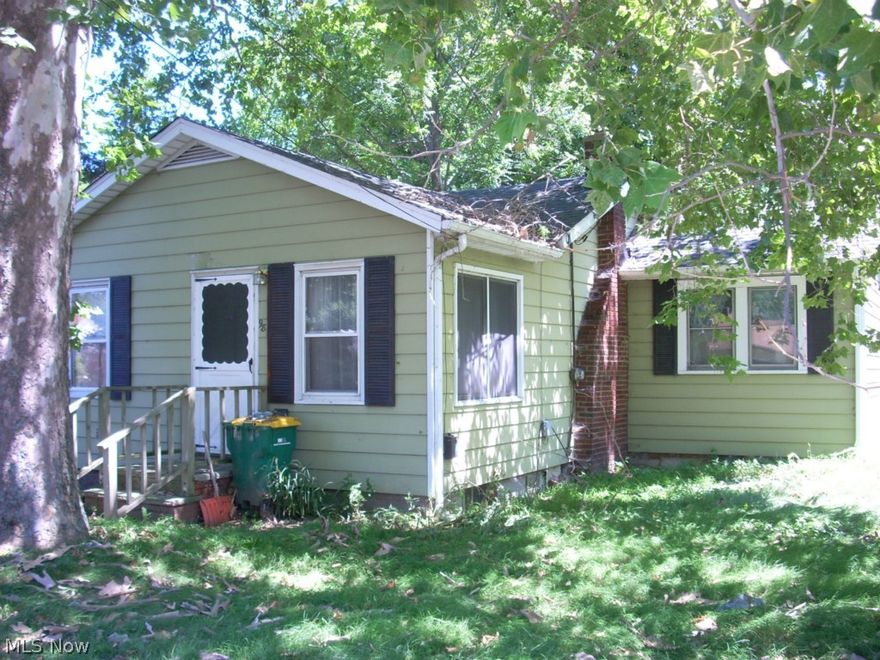House and detached garage on 2 separately parcelled lots. Being sold as one purchase - not separately. House and garage is being sold as-is. If you are willing to do the decorating and rehab - the big stuff like furnace, central air, siding, roof is in good condition! North of Lakeshore Boulevard it is only a short distance to Lake Erie and one of the lakefront parks to watch the sunrise or sunset.