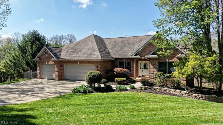 4+ bedroom Ivan Yoder built ranch home on a 15 course mostly finished walkout basement. Excellent modern layout featuring 2+ bedrooms and 2 bathrooms upstairs equipped with a Mulwoods eat in kitchen, formal dining room area, and an open living room leading to a scenic Trex back patio excellent for that morning coffee. Basement feels larger with the 15 course basement. Large open living room, 2 bedrooms, 1 bathroom and 2nd laundry hookup. Plenty of high end finishes including coined brick corners, keystone limestones above the windows and a backup Generac generator. All this on a secluded 2.8 acre lot that is 50/50 wooded to open.