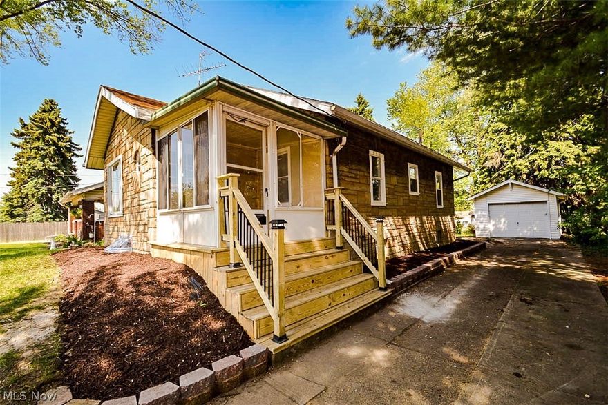 Beautifully updated 2 bedroom Ranch. Updates include new plumbing and drains, hot water tank, new high efficiency furnace, and windows. New paint throughout and new flooring which includes laminate in living and dining rooms, vinyl in kitchen and carpet in bedrooms. Updated bathroom. Basement is clean and dry. Nice driveway for off-street parking leading to a single car garage.