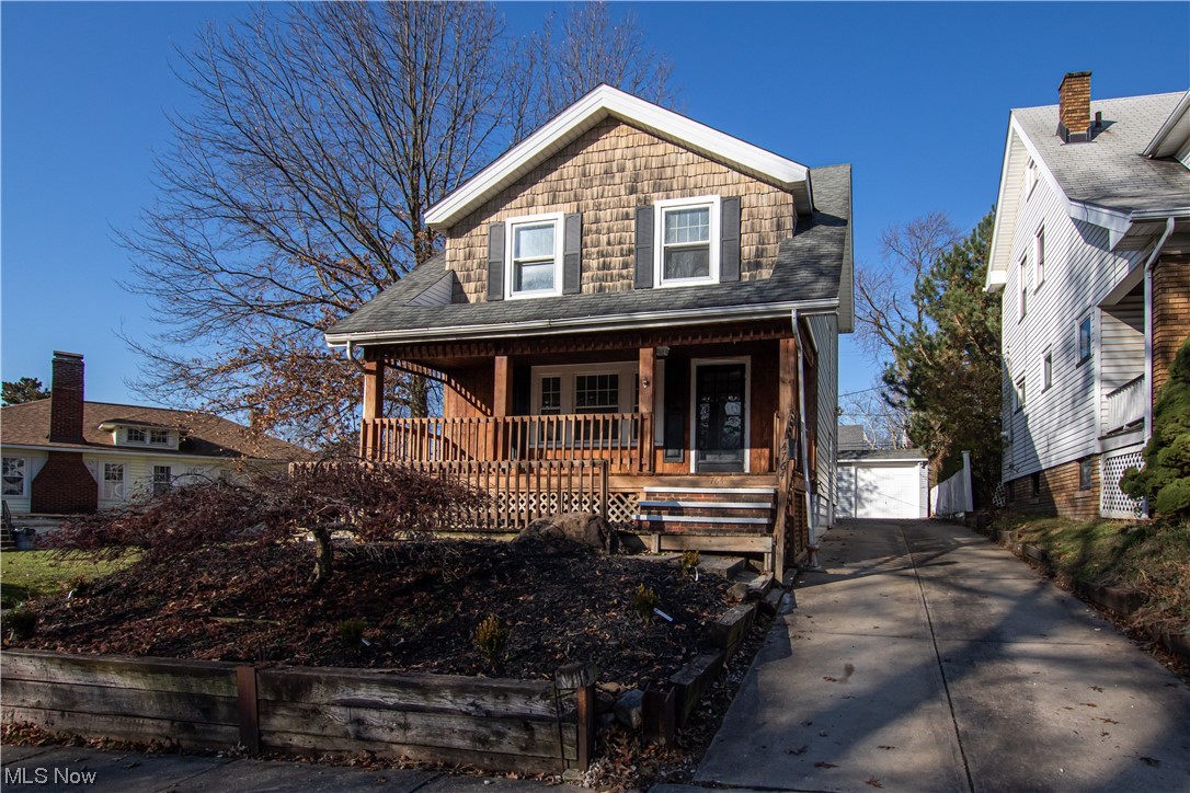 Masterfully renovated 3 bedroom 1.5 bathroom Colonial in the heart of Garfield Heights minutes away from Garfield Park Reservation and all that Garfield Heights has to offer! The transformation of this home is absolutely incredible, no stone has been unturned! Walk into the home and experience the spacious floor plan set with a modern fireplace, a large and gorgeous eat-in kitchen that boasts a modernized restaurant style built-in booth table, white ice granite countertops, newly restored cabinetry, exposed brick, and all new appliances. This meticulously designed modern interior also features all new luxury vinyl plank flooring, new light fixtures throughout, a remodeled bathroom, 3 great sized bedrooms along with a plenty of closet and storage space to utilize. The basement was updated as well to include a recreation room and added cabinetry for additional storage. Other big ticket updates include a newer furnace, updated electrical, and plumbing systems. Not to mention the amazing exterior which includes a huge walk-out deck, large and inviting cover front porch, and a newly sided 2.5 car garage! Live easy knowing this home will provide decades of sustainability and fall in love with the beauty of its modern design.