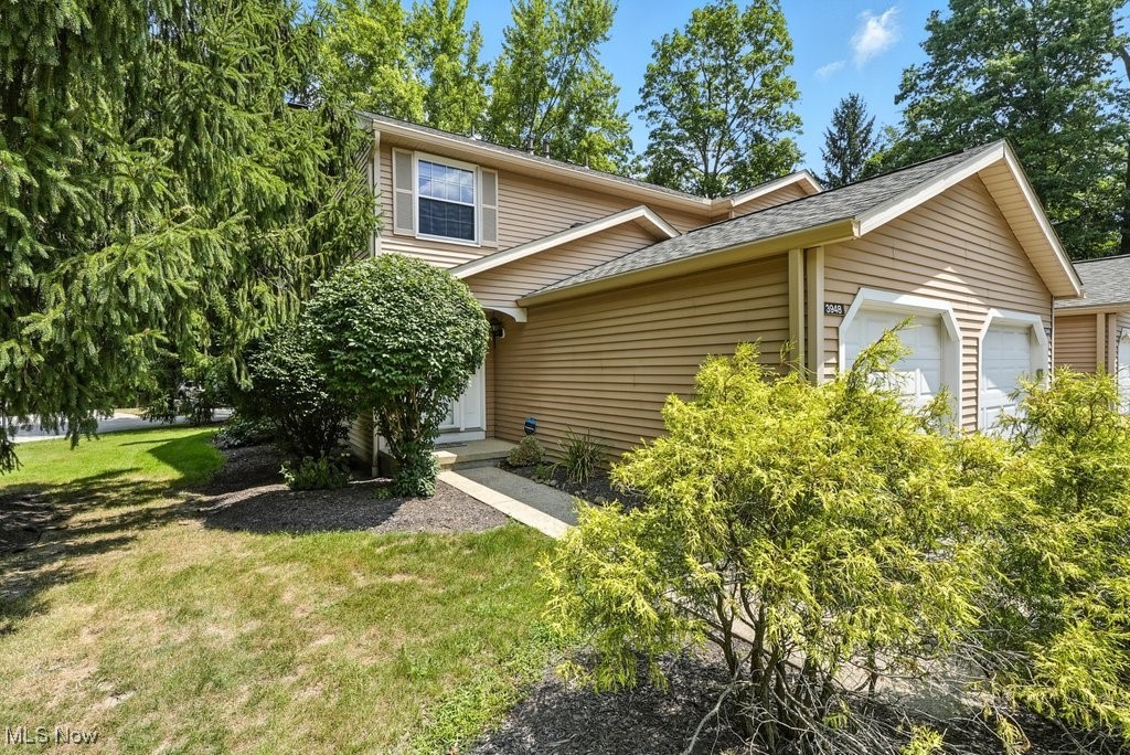 Here's your chance to move right into this well maintained, and updated, condo to enjoy easy, low-maintenance living! Located in the Woodlands neighborhood in Stow, this end-unit townhouse style condo features 2 bedrooms, one and a half bathrooms and over 1300 square feet of finished living space. This freshly painted home has a comfortable and functional layout, starting with an open concept main floor. Featuring an updated kitchen with new appliances and granite countertops, the large breakfast bar flows right into the living room. From the living room step out to enjoy your private, fenced-in patio or cozy up next to the gas-fireplace to relax. A half bath just off the entry from the attached, on-car garage adds convenience for family & friends on this first floor. Upstairs, you'll find two spacious bedrooms and a nicely updated full bathroom. The partially finished basement adds a ton of possibilities. With nature stone flooring, it's ready for whatever you need the extra space for. Plenty of storage space and the in-unit laundry round out the lower level. With its smart layout and ideal, tucked-away location between Stow & Kent, with easy access to dining, shopping & more, this condo is sure not to last. Schedule your showing today!