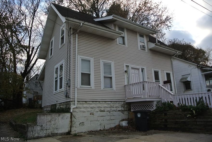 Recently updated with all new interior paint and new carpet in all rooms except kitchen and bath. Oak cabinets in kitchen with door to the rear. Formal dining room between kitchen at rear and living room that runs across the front. First floor bedroom is off the right side of the living room. Two large bedrooms upstairs. Full basement with newer looking furnace. Private dead-end street with off-street parking right in front. Priced for quick sale.