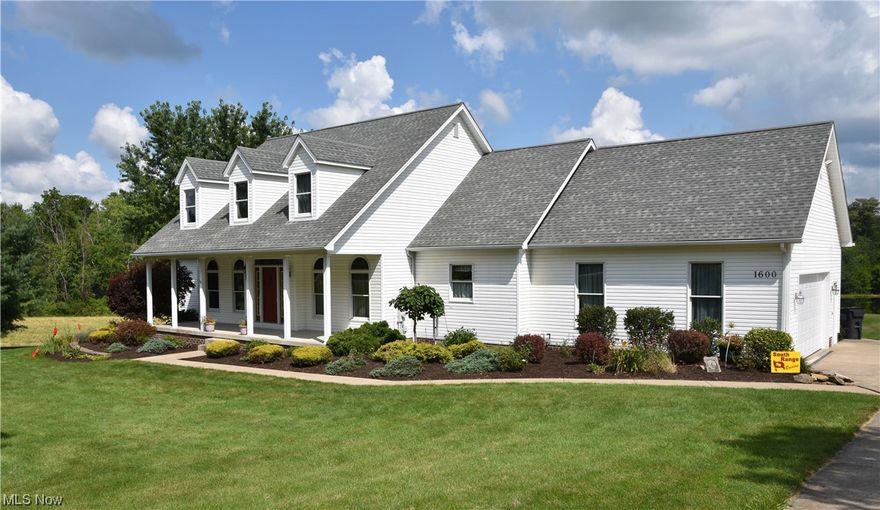 4 bed 4 bath set in an outdoor paradise overlooking a large pond and forest teaming with wildlife. 2 story foyer and 2 story great room with stone gas fireplace and windows looking down at the gorgeous countryside. Classic oak hardwood floors throughout the first floor in an office, spacious master bedroom and dining room. Large kitchen with granite countertops and an eat-on island with barstools, full of cabinet space. Large porch in front, large porch and bilevel deck with hot tub and tons of space for entertaining in back. Oak steps and railing to second floor where a long balcony overlooks the great room. 2 upstairs bedrooms with the extra character of dormers and a full bath. Finished basement with porcelain tile and lots of space for game tables and exercise equipment, living room and television area, full bath, and striking oak bar with poured epoxy top. Behind the bar is a dishwasher, keg dispenser, sink, bar refrigerator, lockable liquor shelves with glass doors and cabinets for all your bar supplies. Over 4000 sf of finished living space with recent new items such as 2 dishwashers, a hot water tank, sump pump, garage door and opener, spigots, and carpet. 30 X 36 pole barn with new steel roof, second floor loft, and 3 extra garage bays. Mineral rights reserved. Listing price includes house and pole barn on approximately 2 acres designated by marked stakes. Offers for the additional pond and/or acreage totaling 25.01 acres will be entertained by the owners.