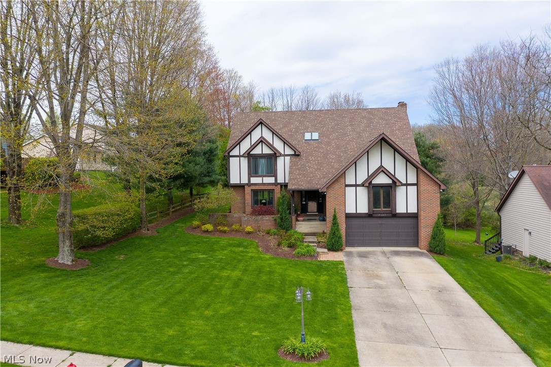 Meticulous, super sharp & updated contemporary colonial in beautiful Surrey Hill Estates! This updated 4 bedroom, 3.5 bath home will impress you the moment you walk in the front door thru the 2 story foyer. Combination living/dining room with hardwood flooring is open to the all season vaulted sun room, which has large windows allowing for an abundance of natural light and has sliders to the huge deck. Updated kitchen features lots of cabinets, pantry, SS appliances, granite counters, nice eating area, which leads to a family room with gas fireplace and another set of sliders to the deck. 1st floor laundry room & powder room complete the 1st floor. All bedrooms are spacious & feature nice closet space. The master is exceptional offering a large walk in closet with California organizers, updated master bath with skylights, new jetted tub, double vanities and granite counters. The walk out lower level is totally finished featuring separate spaces - recreation room/media room, full bath, craft area and office /bonus room with wood burning fireplace and sliders to the beautiful backyard. Enjoy the backyard oasis this summer with the awesome above ground heated pool with composite decking, fire pit area, and shaded gazebo to relax. Whole house water filtration system. Other updates include roof (2013/50 year shingle), furnace/CA & windows (2012), tank less water tank & water softener (2015); heated pool with composite deck (2016), laundry/master bath (2018).