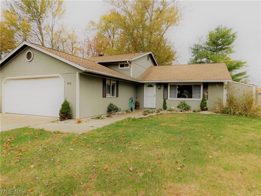 One of a kind Grafton Split Level in Midview Schools. This unique home has an open floor plan concept on the main floor with the kitchen, dining room and living room. The upper level has 3 bedrooms and a full bath. The lower level boasts the 4th bedroom/office, laundry room, 1/2 Bath and family room with a stone hearth wood burning fireplace! Check out the sliding barn doors in the 4th bedroom and 1/2 bath! 2 car attached garage. Storage shed in the pie-shaped lot with large side yard. This home is freshly painted throughout and all the carpets have been cleaned prior to listing. Ready to move in!