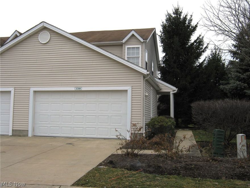 NO PETS OR SMOKERS !! Oversized well-kept end unit with extra windows, green space and guest parking right next door.  Ceramic tiled first floor.  Living room w/sliders to privacy fenced patio overlooking green space -  no one behind you!  Half bath on first level. Second level sports 2 bedrooms – both with cathedral ceilings and double closets.  Ceiling fans in great room, kitchen & master bedroom. Finished basement with new carpeted rec room, full bathroom, laundry room with cabinets & utility sink, and additional storage.  Attached 2 car garage with water available. Security system.  All appliances stay!  Owner pays monthly HOA fee (snow & trash removal included).