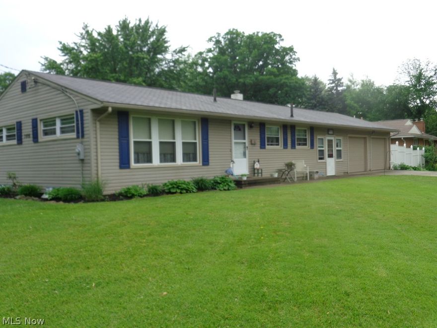 Wonderful 3 bedroom 2 bath ranch.  Beautiful updated kitchen with pantry closet and newer appliances including brand new refrigerator.  Spacious living room with hardwood floors.  Enclosed breezeway opens to back fenced yard.  2.5 car attached garage.  Many updates including vinyl siding, windows, new furnace, hot water tank plus more!  A must see.