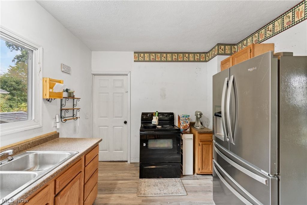 Photo of 38 Walnut Court, Mogadore, OH 44260 (MLS # 5192129)