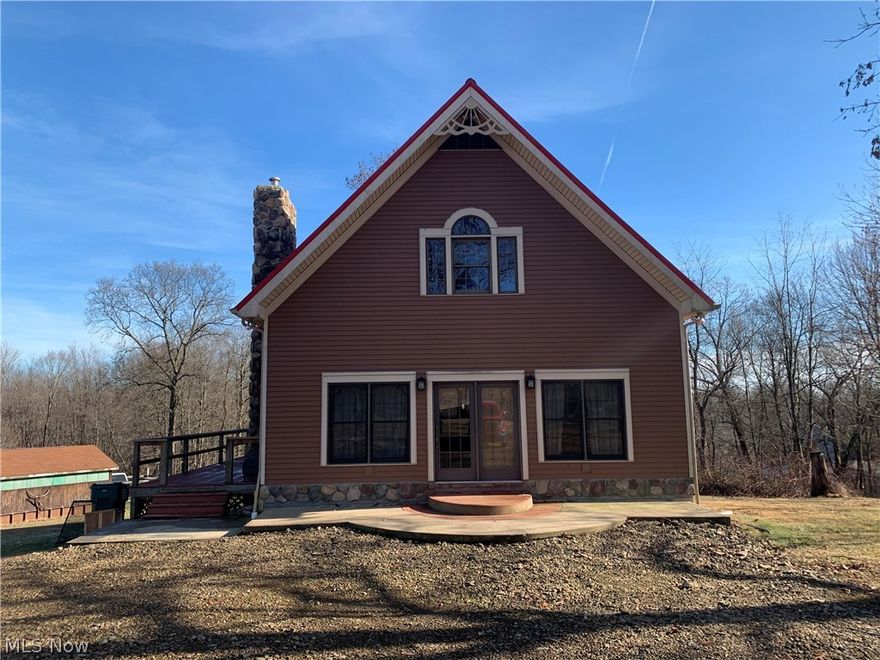 Come to the country to enjoy a peaceful 11 acre mini farm and get away to 2700 acres of public horseback riding trails in Beaver Creek State Park that's accessible through public and private land and Beaver Local Schools. The home features an open floor plan with kitchen, dining area and great room with gas fireplace. There are 2 bedrooms on main floor and master bedroom suite in loft area. Master bedroom has a walk-in closet and half bath with the potential to install a tub. Partially finished basement has many possibilities including a kitchen, rec room, full bath room, laundry room, and furnace area. The heating includes oil forced air furnace and a wood burner that can heat entire home. Step outside on to a large 10X44' deck to relax and watch all the wildlife and orchard including many fruit bearing trees and bushes. or the  A large detached garage features two lean two’s, tack room, stall, turnout, with about 3 acres of partially fenced pasture. Two additional outbuildings featur