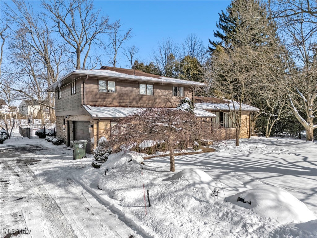 This stunning “original” mid-century modern home is located in one of Plain Township’s well-established & iconic neighborhoods. As you tour this 4 bedroom/ 2.5 bath home, you’ll notice this is not your typical split floorplan - the rooms are abundant in size & offer a fair amount of openness & illumination throughout. The living room encompasses a very vast picture window & opens into a sizable dining room. The kitchen was designed to be the heart of the home & is large enough for spacious informal dining. For the inspired home chef, you'll love the built-in double ovens, gas cooktop, and countertop work space not to mention plenty of flush-paneled cabinetry. A grand stone floor-to-ceiling fireplace with a brand new mantel is the central feature of the family room where most of your living and entertaining will occur. There's a guest bathroom & walk-in pantry/mudroom/bar adjacent to the family room. The study would make the perfect home office, suitable even for two, with bi-fold doors for complete privacy plus access to exit. Another bonus of this house is the public water/public sewer!! Updates include: New Iron Fence, New HWT, New Sump Pumps & Backups, New Dishwasher, Updated Exterior Landscaping, Bathrooms Updated, Basement Paint/New Carpet, New Gutters, New Asphalt Driveway, New Hot Tub, Whole Home Paint/Carpet, Fireplace Mantel, Exterior Doors Schedule a showing today!