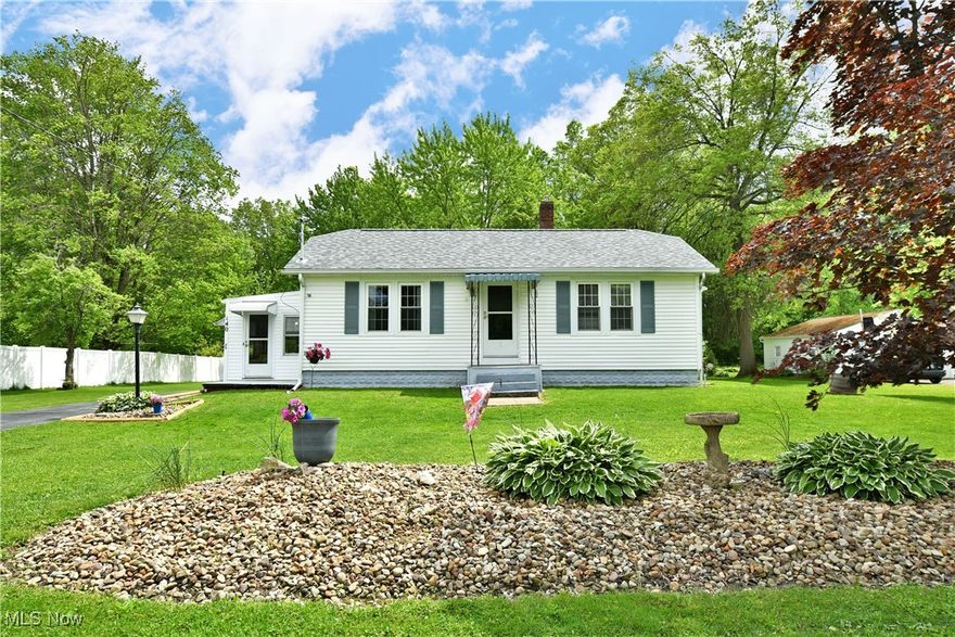 Everything you’ve been looking for and more! This meticulously kept Champion ranch delights with its impressively spacious layout and a huge yard, all paired with a fantastic location. This move-in-ready residence sits along a quiet side street just minutes from downtown attractions and dining alike with its sprawling layout that you won’t want to miss. Attractive colorways and neatly tendered landscaping offer instant curb appeal as the blacktop drive extends to find a gravel turnaround and two car attached garage parking. A bonus storage shed looks on from the backyard as paver lined patio space is just steps from the corner sunroom. Through the formal entrance, a gracious carpeted living room enjoys plenty of natural light and hidden storage at the far end. Warm wood trim accents add to the appeal. Around the corner, casual dining overlooks the robust kitchen, showcasing wood styled countertops and stainless still appliances all set within handsome tile work. Down the hall, a pair of inviting bedrooms include a central offering with an attached full bath. Meanwhile, a third oversized master bedroom rises above the garage with its expansive footprint, walk-in closet and brightly colored private half bath. Laundry, storage and workshop areas preside at the basement level.