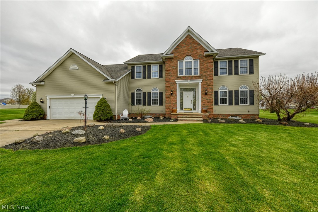 INCREDIBLE home in Cuyahoga Falls, located on a cul-de-sac in the beautiful Regent Park allotment. Custom built home w/ meticulous attention to detail. Starting w/ the impressive entrance of the bright front foyer, this sets the tone for the space & quality found throughout the home. To the right is the formal living room. This opens up to the massive living room, w/ wood burning/gas fireplace, lots of windows & wide open to the kitchen. Large informal eating area has sliders to the back yard. The sizable kitchen offers endless solid oak Schrock cabinets, including a pull out pantry, solid surface countertops, built-in desk & all appliances included. There is also a formal dining room off of the kitchen too! Down the hall is a large closet, spacious half bathroom, laundry/mudroom with access to the back yard, garage access & first floor bedroom/office (has closet). Up the grand staircase to find 4 more bedrooms & 2 full baths. You will adore the loft/sitting area in front of