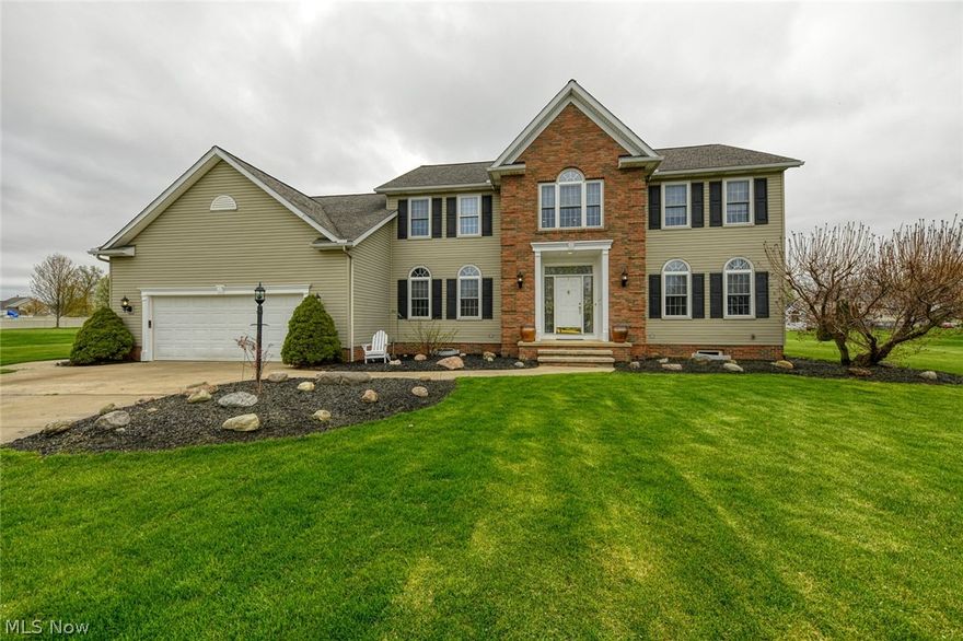 INCREDIBLE home in Cuyahoga Falls, located on a cul-de-sac in the beautiful Regent Park allotment.  Custom built home w/ meticulous attention to detail.  Starting w/ the impressive entrance of the bright front foyer, this sets the tone for the space & quality found throughout the home.  To the right is the formal living room.  This opens up to the massive living room, w/ wood burning/gas fireplace, lots of windows & wide open to the kitchen.  Large informal eating area has sliders to the back yard.  The sizable kitchen offers endless solid oak Schrock cabinets, including a pull out pantry, solid surface countertops, built-in desk & all appliances included.  There is also a formal dining room off of the kitchen too!  Down the hall is a large closet, spacious half bathroom, laundry/mudroom with access to the back yard, garage access & first floor bedroom/office (has closet).  Up the grand staircase to find 4 more bedrooms & 2 full baths.  You will adore the loft/sitting area in front of