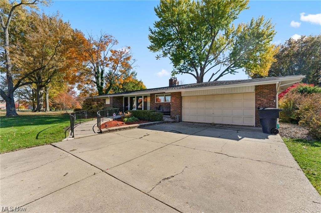 Yes, you read that right- over FOUR Thousand square feet of flexible living space in this sprawling ranch home! Thoughtfully designed for accessibility: Ramps on Exterior, Brand New Wheelchair Lift System, Elevator, Track/Lift system, Shower and more. Mid-Century Modern flare gives the home personality with a bright, open floorplan. On the main floor: Semi-Open Concept Great Room/Kitchen/Dining area, Sunroom, 3 large bedrooms, 2 full bathrooms, first floor laundry. Lower Level: 2nd Full Kitchen, 3rd Full Bath, Bar, MASSIVE rec room, a 4th huge bedroom (Could easily make a 5th). All appliances stay, New Washer and Dryer, Updated Electrical, Central Air and more. This versatile home has the space and functionality for everyone to feel right at home! Conveniently located to all that Beautiful Warren Ohio has to offer! Minutes to Downtown, Trumbull Country Club, and highway access!