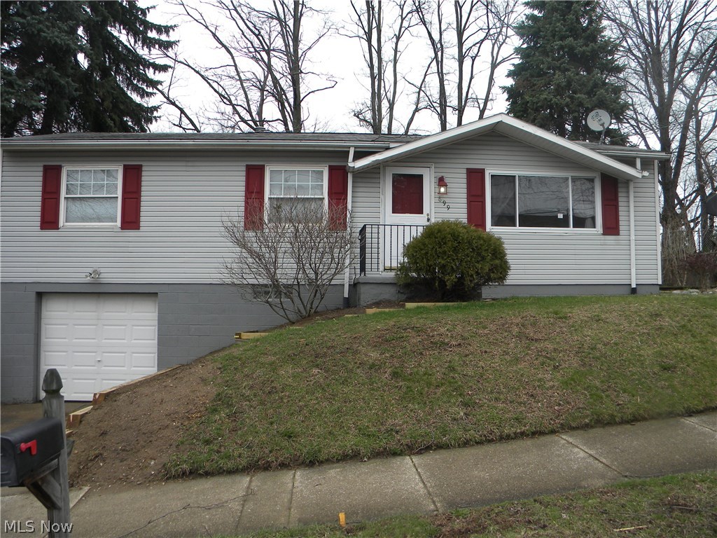 Can't miss this beautiful remodeled raised ranch 3 bed 1.5 bath, attached garage, with a great privet back yard. New Flooring, new hot water tank and central air conditioner, glass block windows, and both bathrooms remodeled. New Flooring, full Kitchen updates, and much more. Close to shopping and highways, quick closing........Move in ready!