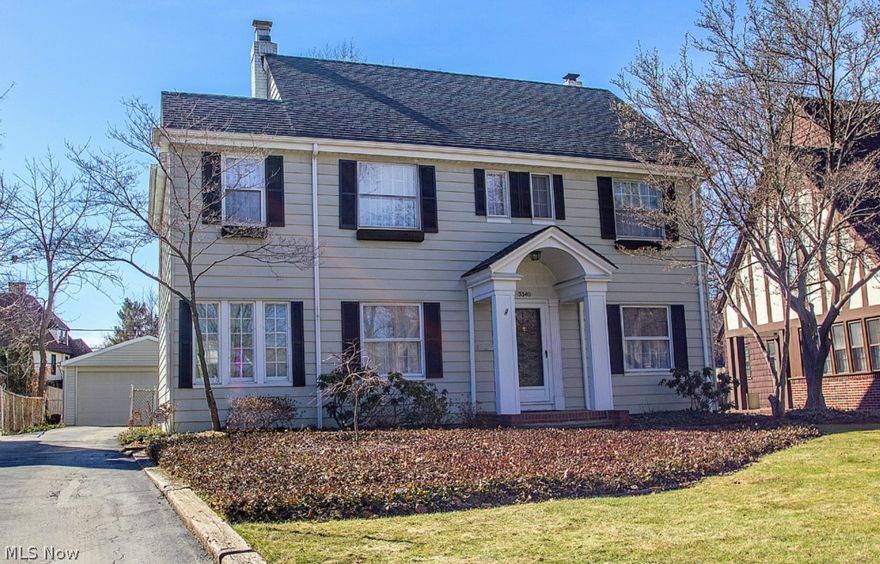 Classic 3 BR, 2.2 BA center hall colonial  is light & bright & boasts spacious, updated eat-in Kitchen, and gleaming hardwood floors. The Dining Room has built-in china cupboards & chair rail; the large Living Room features a magnificent stone fireplace, and there is also a Family Room/Office.  The Master Suite has an attached full bath, dressing area and walk-in closets. There is a lower level rec room with built-ins and a 1/2 bath. Outside there is a lovely stone patio overlooking the back yard.