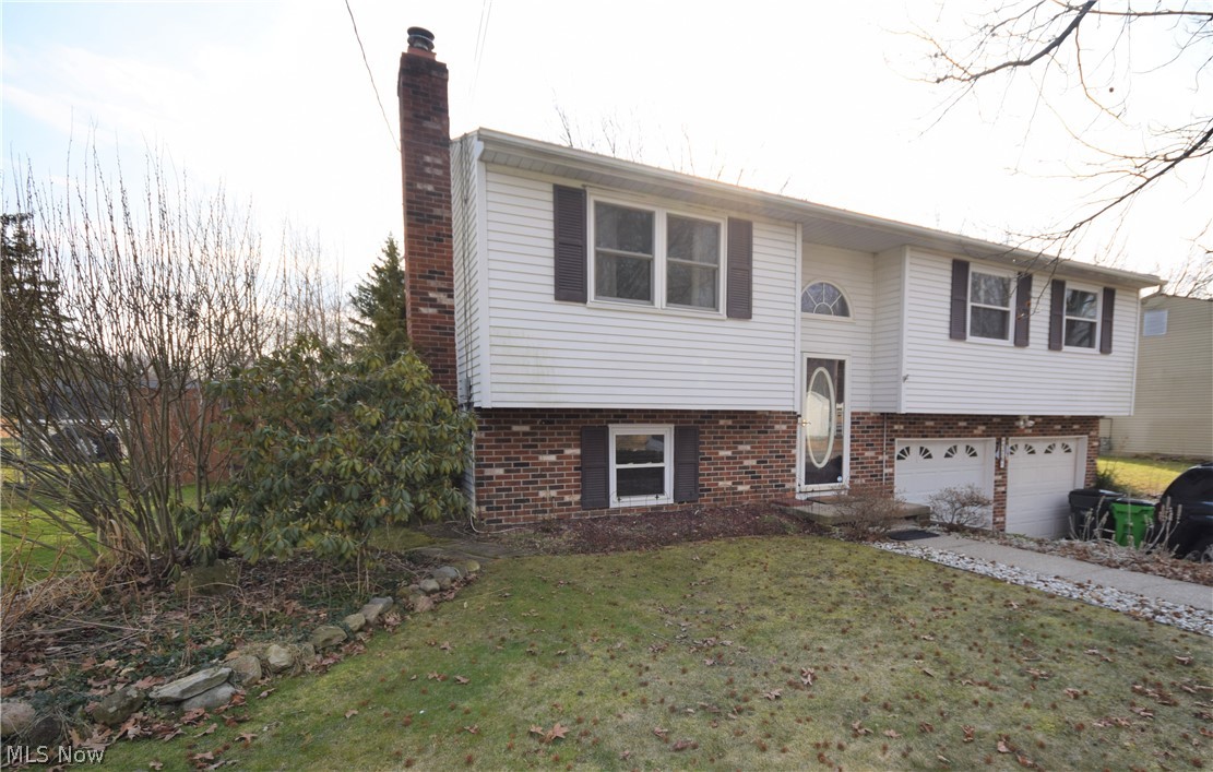 Welcome to 376 Hiwood Avenue; a 3-bedroom, 1.5-bathroom home in Munroe Falls! This lovely home has newer stainless steel appliances in the eat-in kitchen. The spacious living room has hardwood floors. The owners’ suite has updated vinyl plank flooring, a large picture window overlooking the backyard, and a spacious closet. Two additional nicely sized bedrooms are located on the mail level in addition to the full bathroom. The bathroom has lots of extra storage space between the large vanity and built-in open shelves. The lower level offers a ton of extra living space -- it has an incredible brick fireplace, a half bathroom, a convenient closet, access to the attached two-car garage, and the laundry area. A spectacular deck is located on the back of the house, overlooking the large, privately fenced in backyard. This home is located in a desirable, quiet neighborhood, just minutes away from various restaurants and shopping areas. Don’t miss your chance to own this amazing home!