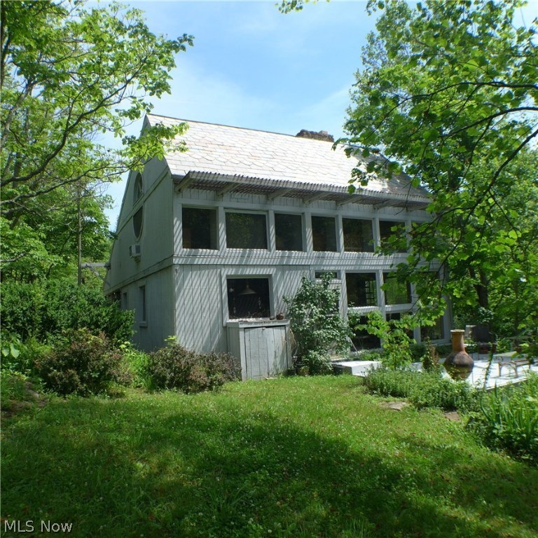 This uniquely built home is located in Glouster, OH, situated off of Irish Ridge Road on Township Road 298. Offering a spacious open floor plan and an abundance of natural lighting. Being located on an almost 12 acre tract this property offers seclusion, privacy and beautiful views.