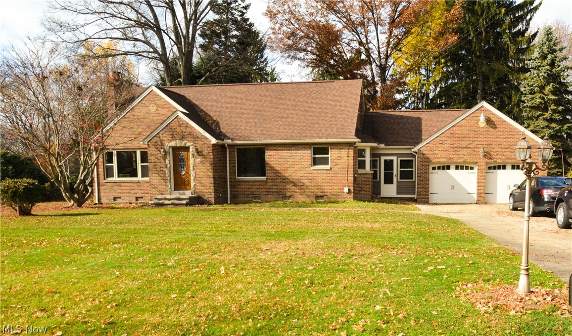 Nicely updated All Brick Cape Cod style home nestled on a half-acre lot. Move-in ready with a beautifully remodeled eat-in kitchen with new cabinets, granite countertops and a ceramic tile floor. Both Bathrooms are newly remodeled with professionally designed and installed ceramic tile work. Hardwood floors in the dining room, living room and bedrooms. An office/bonus room on the first floor can easily be converted to a bedroom with the addition of a closet. Newly finished family room and a bonus room in the basement. All windows have been replaced including glass block in basement and garage, new front door, newer roof, A/C and hot water tank in 2013. Both garage doors along with one garage door opener are new. Enjoy the large yard and the enclosed 10'x16' breezeway