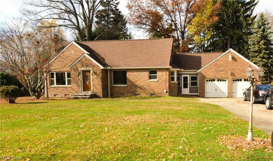 Nicely updated All Brick Cape Cod style home nestled on a half-acre lot. Move-in ready with a beautifully remodeled eat-in kitchen with new cabinets, granite countertops and a ceramic tile floor. Both Bathrooms are newly remodeled with professionally designed and installed ceramic tile work. Hardwood floors in the dining room, living room and bedrooms. An office/bonus room on the first floor can easily be converted to a bedroom with the addition of a closet. Newly finished family room and a bonus room in the basement. All windows have been replaced including glass block in basement and garage, new front door, newer roof, A/C and hot water tank in 2013. Both garage doors along with one garage door opener are new. Enjoy the large yard and the enclosed 10'x16' breezeway