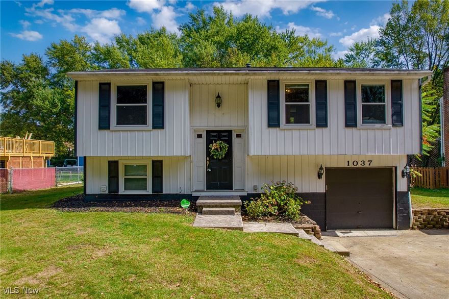 Welcome to this beautifully maintained 3-bedroom, 1.5-bath bi-level home perfectly situated near Downtown Kent and Kent State University. Thoughtfully updated and ready for its next owner, this home offers a blend of modern touches and comfortable living.

On the main floor, you’ll find:

An open-concept living and dining room filled with natural light.

An updated kitchen with modern finishes, perfect for everyday meals or entertaining.

Three generously sized bedrooms and a full, updated bathroom.

The lower level provides additional space to spread out with:

A cozy second gathering room, ideal for a family room, playroom, or home office.

A convenient half bath, laundry area, and storage room.

Direct access to the attached garage.

Step outside from the dining room onto the covered deck, overlooking a large fenced-in backyard with private wooded views—perfect for relaxing, entertaining, or enjoying nature right at home.

With its updates, move-in ready condition, and desirable location, this home offers the best of comfort and convenience in Kent.