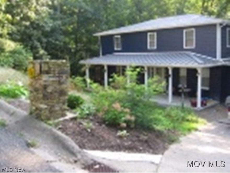 Great floor plan, private wooded lot & quality renovations. Large covered front porch w/ceiling fans. Light & airy formal living room. Kitchen w/Hickory cabinetry, good counter space, tile backsplash, recessed lighting, bar area & open to the family room w/stone wall & WBFP, Beautiful laundry room w/great counter space on the solid surface epoxied Silestone countertops, abundance of cabinets, backsplash, stainless steel utility sink,  epoxied tile flooring, computer area & private half bath. Master w/2 closets & one of a kind water proof bath. Lower rec. room w/large stone bar area.  Elem: Putnam Elementary School  Elem/Bus: N  JrHigh: Marietta Middle School School  JrHigh/Bus: Y  High: Marietta High School  High/Bus: Y  Fire: VOL  Police: SHF  ;SQFT=Fin L1:1080, Fin L2:1160, Fin Bsmt:850, Fin Above:2240, Fin Total:3090, Unfin Bsmt:225, Unfin Above:225;GAR= 2 Car Att, Opener(s);PRKG= Off Street, On Street