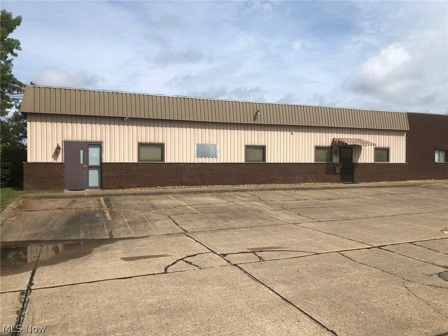 Conveniently located near interstate,  Rubber roof.  Could be separated into two offices.  Move into one and rent the other.  Good investment property.  Approximately 15 parking spaces.  This property is leased.  Call listing office for details