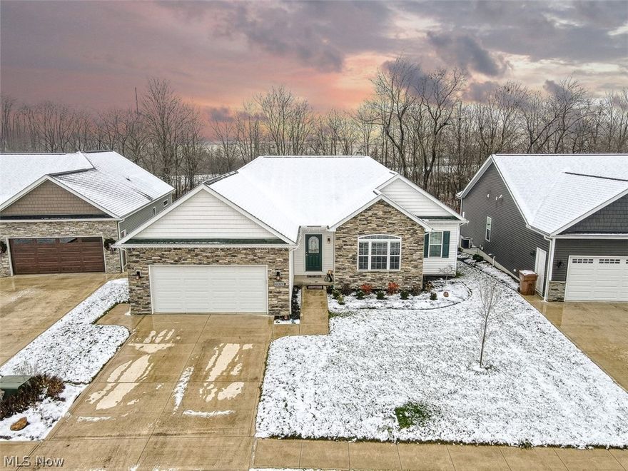 Welcome to Autumn Meadows this 3 bedroom 2 bath ranch was built in 2017! This home was built with all the upgrades and made with the highest quality material. The house has custome sheer/darkening option blinds on every window, engineered harwood floors, living room, kitchen and master bath have dimming lights. There is wiring all set up for surround sound and/or stereo speakers. Kitchen has gorgeous granite counter tops, white custome cabinets, slate appliances with a large pantry. The deck overlooks the wooded lot providing beautiful scenery and is made of trex (composite) and screened in even below the deck floor. The deck also has a ceiling fan and light along with an outlet. There is also a cement pad under the patio. The railroad tracks behind the woods are inactive. The nine foot ceilings and the very large windows give the home an open feel with plenty of natural light. There is a barn door that provides privacy to the bedrooms and bath. Great in law suite! The master bath is d