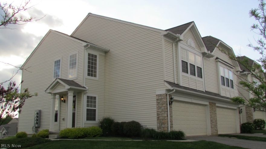 This spectacular home is 4 years young! Many upgrades to this trendy end unit town home!  Brand new carpet 2014, 9ft ceilings, glamour kitchen with granite countertops, stainless appliances, hardwood floors, dining area overlooking pond. Lovely spacious 2 story foyer, very large master bedroom suite with walk in closet, 2nd floor laundry, and spacious loft. Neutral decor, neat and clean, ready to move in. You will be impressed with the little things in this home such as upgraded fixtures, lighting, hardware and doorknobs, etc. You will find the location convenient to shopping and restaurants, parks, as well as friendly neighborhood.