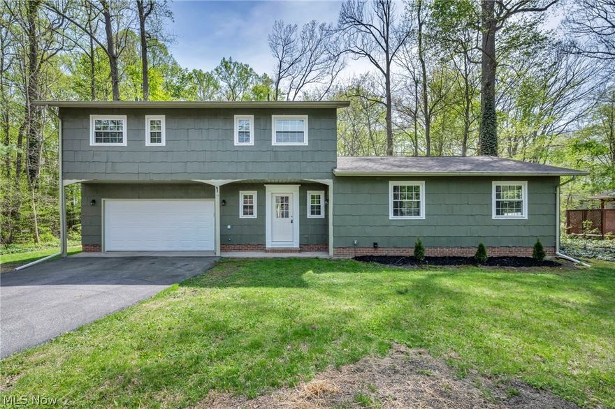Welcome to 8556 Barbara, located in the highly sought-after city of Mentor, OH, on a quiet and serene street. As you step inside, you’re immediately greeted by a stunning open-concept kitchen—the true centerpiece of the home—fully updated with shaker cabinets, quartz countertops, a full-height quartz backsplash, and brand-new appliances. The space opens directly into the dining and living areas, creating a natural flow throughout the main level.

The main level features beautiful original hardwood floors extending through much of the space. Just down the hall, you’ll find a half bath and a versatile room featuring a fireplace and built-in shelving—perfect for a family room or home office.

Upstairs, all three bedrooms offer ample closet space along with generous storage throughout. The spacious primary suite includes a private en-suite full bath.

The finished basement adds valuable additional living space with built-in storage, ideal for entertaining, a home gym, or recreation area. Step outside to enjoy a peaceful backyard with a scenic wooded backdrop, creating a private and relaxing setting perfect for entertaining or unwinding in the evenings.

A pre-listing inspection has been completed, with the report available for buyer review.